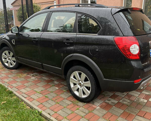 Черный Шевроле Каптива, объемом двигателя 2.4 л и пробегом 51 тыс. км за 9500 $, фото 1 на Automoto.ua