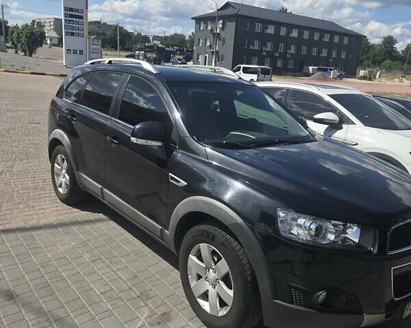 Черный Шевроле Каптива, объемом двигателя 2.38 л и пробегом 240 тыс. км за 10400 $, фото 4 на Automoto.ua