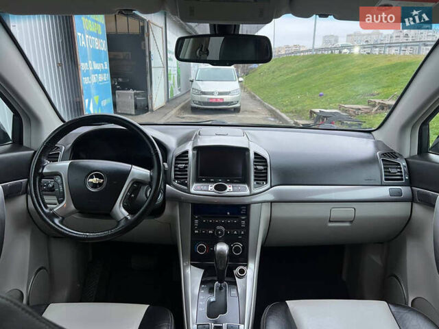 Черный Шевроле Каптива, объемом двигателя 2.2 л и пробегом 129 тыс. км за 12500 $, фото 27 на Automoto.ua