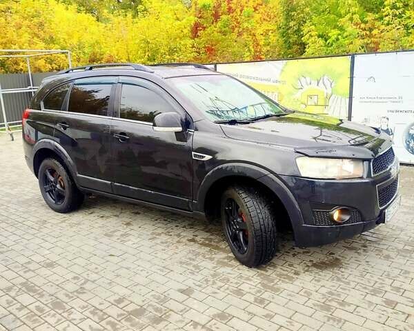 Черный Шевроле Каптива, объемом двигателя 2.2 л и пробегом 217 тыс. км за 10000 $, фото 11 на Automoto.ua