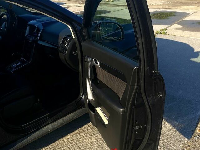 Черный Шевроле Каптива, объемом двигателя 2.4 л и пробегом 220 тыс. км за 9500 $, фото 1 на Automoto.ua