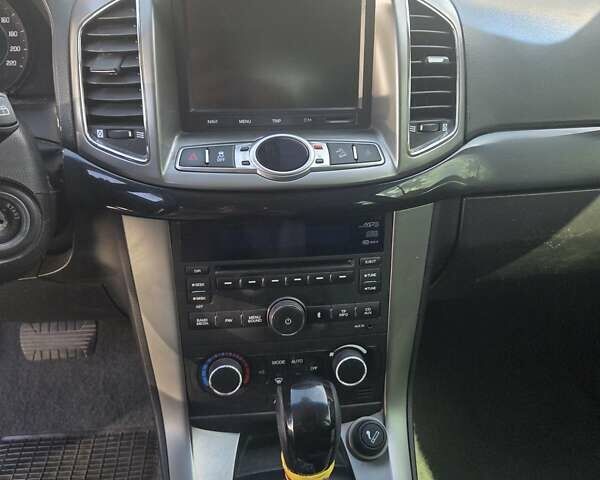 Черный Шевроле Каптива, объемом двигателя 2.38 л и пробегом 240 тыс. км за 10400 $, фото 12 на Automoto.ua