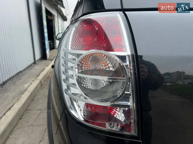 Черный Шевроле Каптива, объемом двигателя 2.2 л и пробегом 129 тыс. км за 12500 $, фото 50 на Automoto.ua