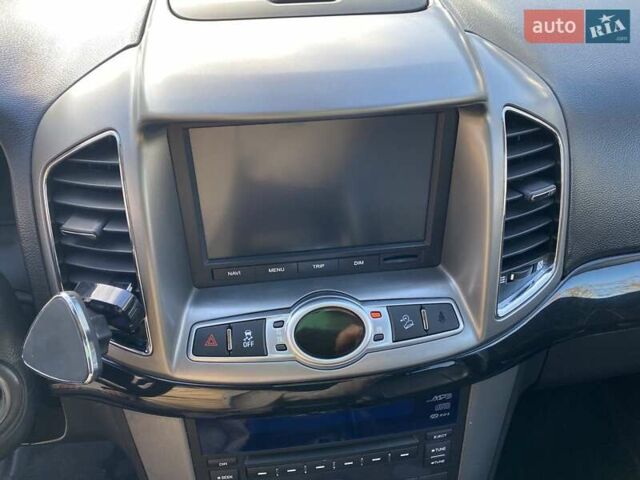 Черный Шевроле Каптива, объемом двигателя 2.4 л и пробегом 206 тыс. км за 12499 $, фото 44 на Automoto.ua