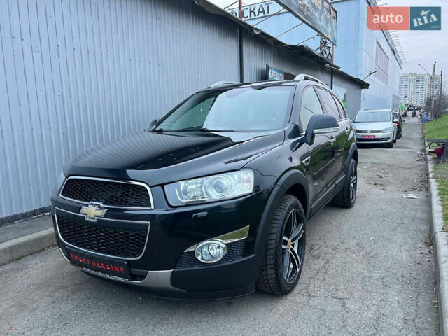Черный Шевроле Каптива, объемом двигателя 2.2 л и пробегом 129 тыс. км за 12500 $, фото 1 на Automoto.ua