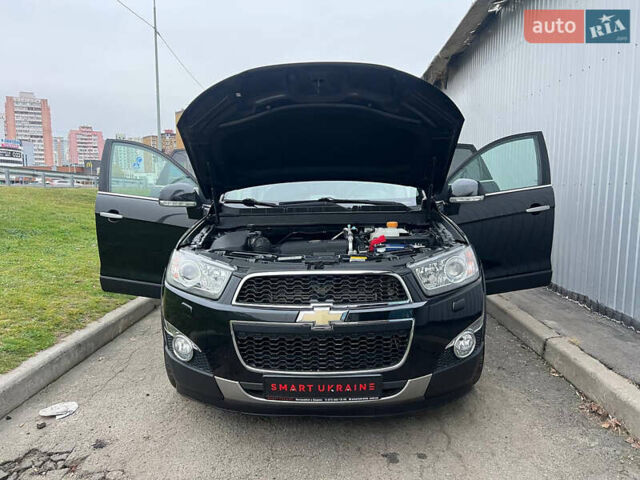 Черный Шевроле Каптива, объемом двигателя 2.2 л и пробегом 129 тыс. км за 12500 $, фото 73 на Automoto.ua