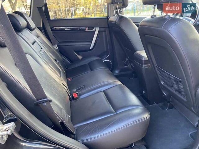 Черный Шевроле Каптива, объемом двигателя 2.4 л и пробегом 206 тыс. км за 12499 $, фото 29 на Automoto.ua