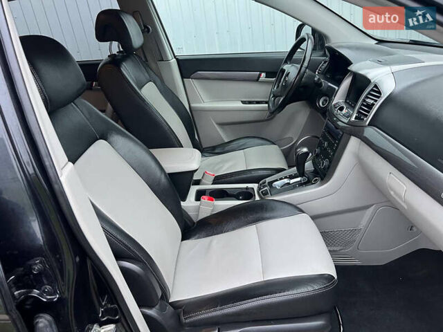 Черный Шевроле Каптива, объемом двигателя 2.2 л и пробегом 129 тыс. км за 12500 $, фото 28 на Automoto.ua