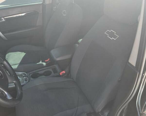 Черный Шевроле Каптива, объемом двигателя 2.38 л и пробегом 240 тыс. км за 10400 $, фото 11 на Automoto.ua