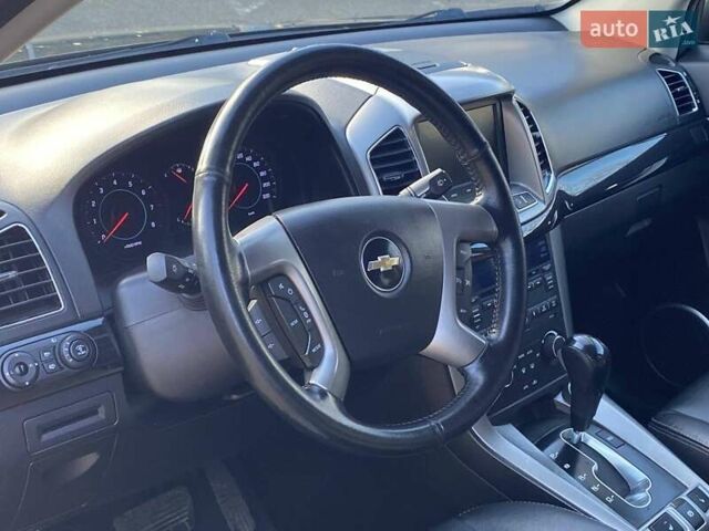 Черный Шевроле Каптива, объемом двигателя 2.4 л и пробегом 206 тыс. км за 12499 $, фото 25 на Automoto.ua