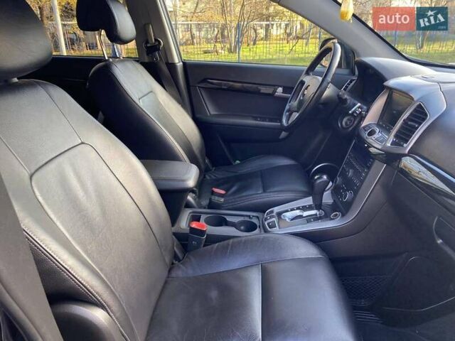 Черный Шевроле Каптива, объемом двигателя 2.4 л и пробегом 206 тыс. км за 12499 $, фото 31 на Automoto.ua