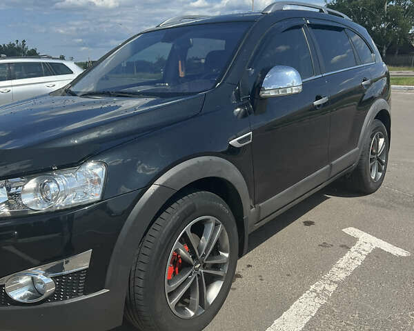 Черный Шевроле Каптива, объемом двигателя 2.2 л и пробегом 206 тыс. км за 11499 $, фото 20 на Automoto.ua