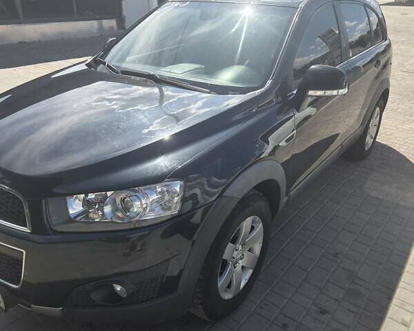 Черный Шевроле Каптива, объемом двигателя 2.38 л и пробегом 240 тыс. км за 10400 $, фото 1 на Automoto.ua