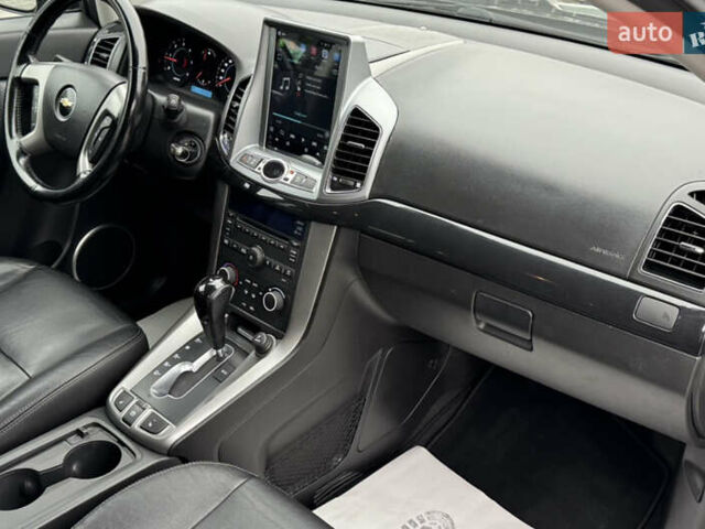 Черный Шевроле Каптива, объемом двигателя 2.2 л и пробегом 150 тыс. км за 12250 $, фото 21 на Automoto.ua