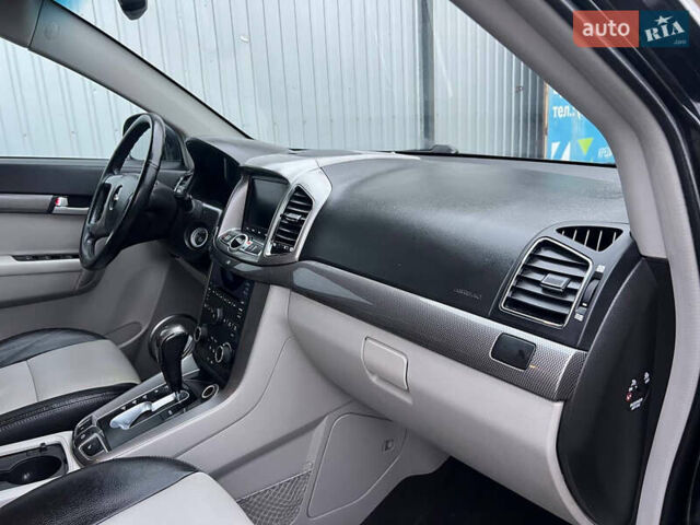 Черный Шевроле Каптива, объемом двигателя 2.2 л и пробегом 129 тыс. км за 12500 $, фото 68 на Automoto.ua