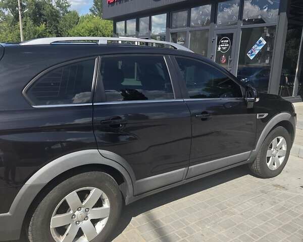 Черный Шевроле Каптива, объемом двигателя 2.38 л и пробегом 240 тыс. км за 10400 $, фото 5 на Automoto.ua