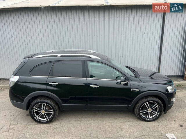 Черный Шевроле Каптива, объемом двигателя 2.2 л и пробегом 129 тыс. км за 12500 $, фото 52 на Automoto.ua