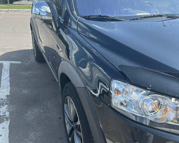 Черный Шевроле Каптива, объемом двигателя 2.2 л и пробегом 206 тыс. км за 11499 $, фото 17 на Automoto.ua