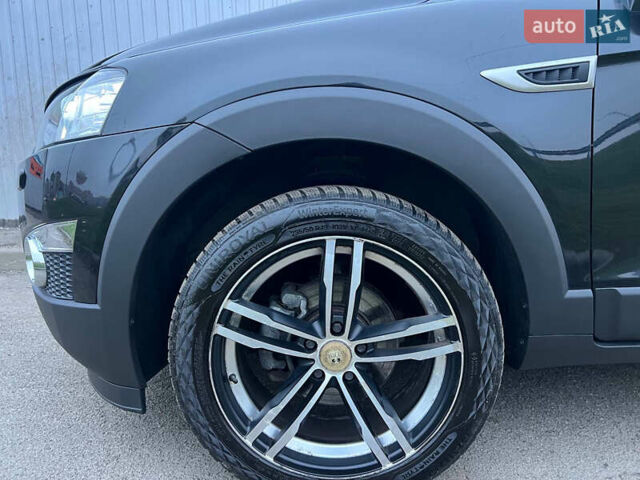 Черный Шевроле Каптива, объемом двигателя 2.2 л и пробегом 129 тыс. км за 12500 $, фото 87 на Automoto.ua