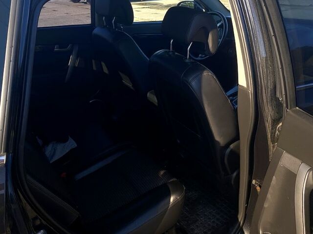 Черный Шевроле Каптива, объемом двигателя 2.4 л и пробегом 220 тыс. км за 9500 $, фото 2 на Automoto.ua