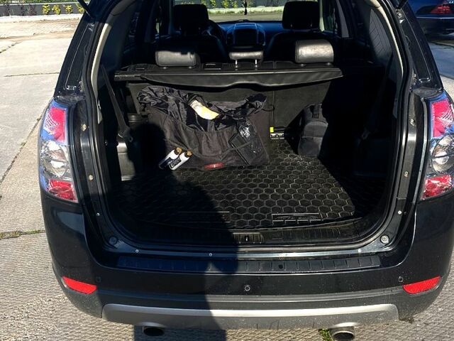 Черный Шевроле Каптива, объемом двигателя 2.4 л и пробегом 220 тыс. км за 9500 $, фото 3 на Automoto.ua