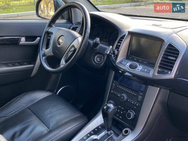 Черный Шевроле Каптива, объемом двигателя 2.4 л и пробегом 206 тыс. км за 12499 $, фото 33 на Automoto.ua