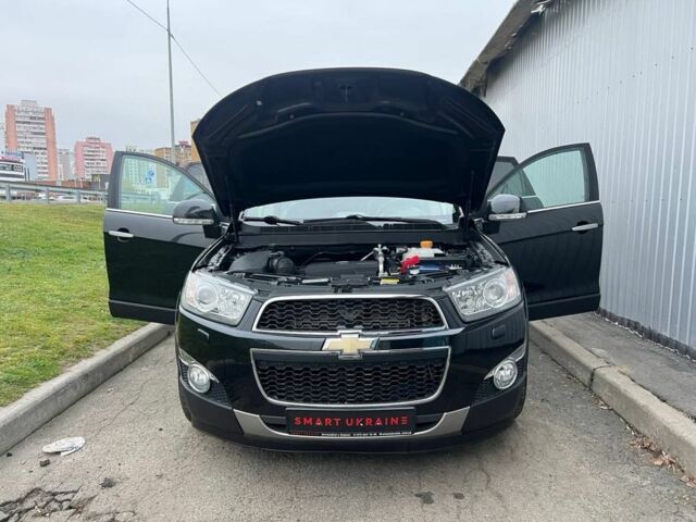 Черный Шевроле Каптива, объемом двигателя 2.2 л и пробегом 129 тыс. км за 12500 $, фото 12 на Automoto.ua