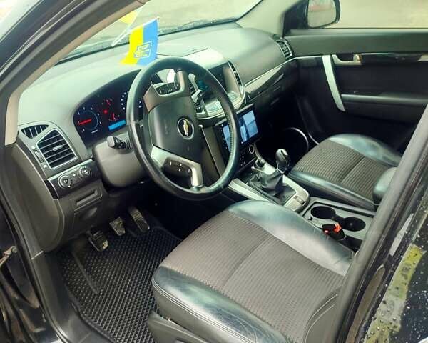 Черный Шевроле Каптива, объемом двигателя 2.2 л и пробегом 217 тыс. км за 10000 $, фото 21 на Automoto.ua