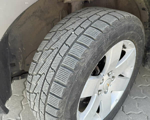 Чорний Шевроле Каптіва, об'ємом двигуна 2.2 л та пробігом 206 тис. км за 7600 $, фото 13 на Automoto.ua
