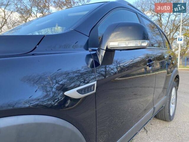 Черный Шевроле Каптива, объемом двигателя 2.4 л и пробегом 206 тыс. км за 12499 $, фото 48 на Automoto.ua