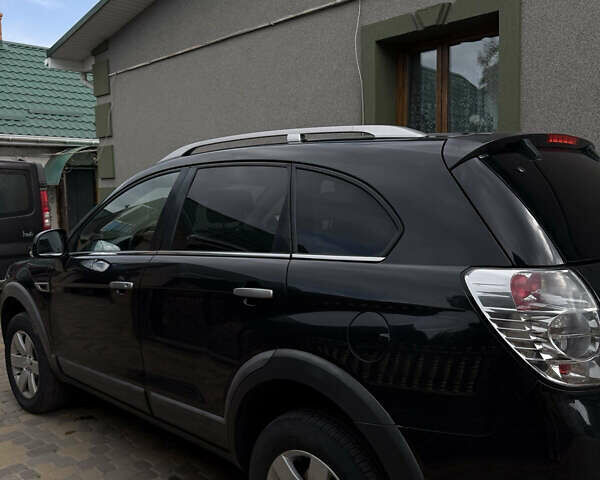 Черный Шевроле Каптива, объемом двигателя 2.2 л и пробегом 350 тыс. км за 10000 $, фото 5 на Automoto.ua