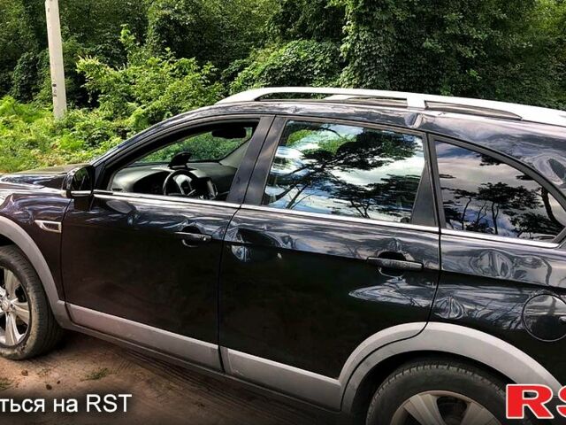 Черный Шевроле Каптива, объемом двигателя 2.4 л и пробегом 166 тыс. км за 7500 $, фото 2 на Automoto.ua