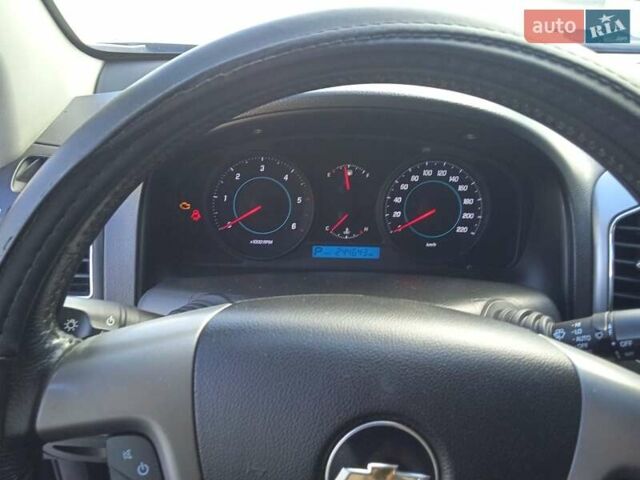 Черный Шевроле Каптива, объемом двигателя 2.23 л и пробегом 245 тыс. км за 11800 $, фото 12 на Automoto.ua