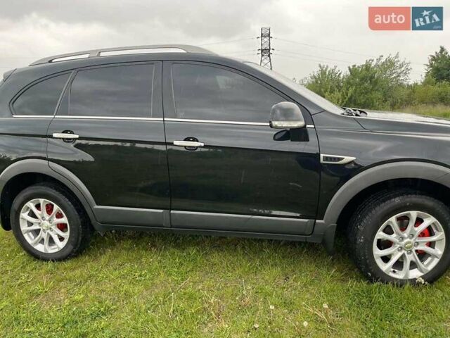 Черный Шевроле Каптива, объемом двигателя 2.23 л и пробегом 138 тыс. км за 12500 $, фото 26 на Automoto.ua