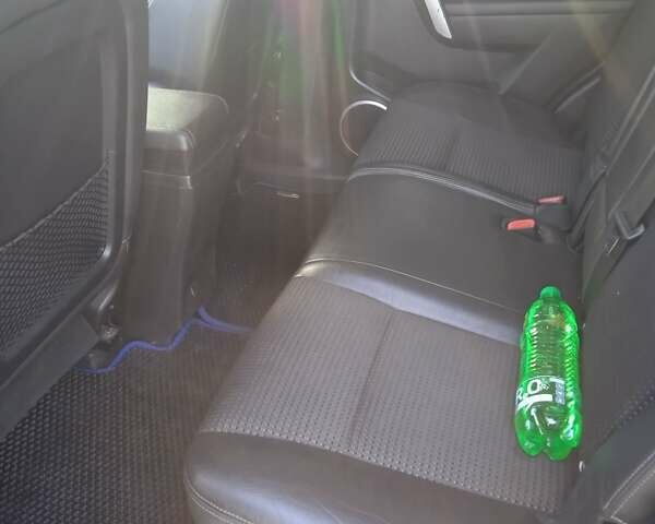 Черный Шевроле Каптива, объемом двигателя 2.23 л и пробегом 245 тыс. км за 11800 $, фото 11 на Automoto.ua