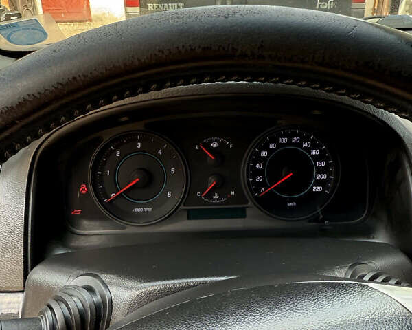 Черный Шевроле Каптива, объемом двигателя 2.2 л и пробегом 350 тыс. км за 10000 $, фото 14 на Automoto.ua