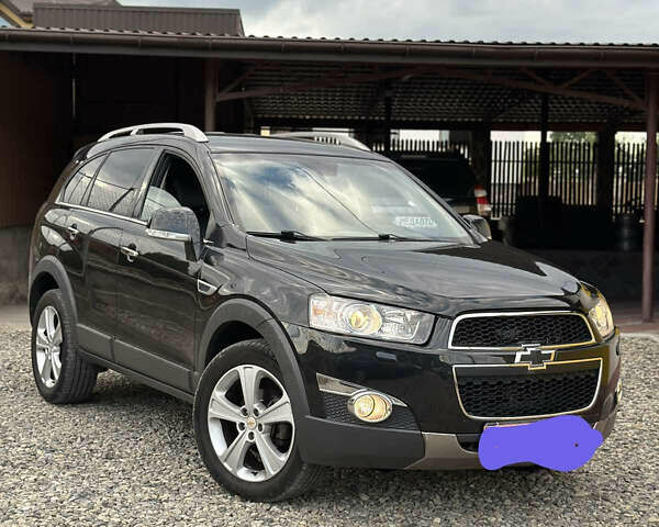 Черный Шевроле Каптива, объемом двигателя 2.23 л и пробегом 178 тыс. км за 11500 $, фото 1 на Automoto.ua