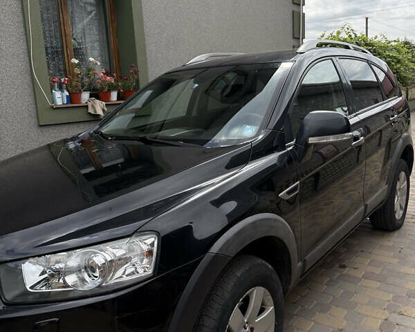 Черный Шевроле Каптива, объемом двигателя 2.2 л и пробегом 350 тыс. км за 10000 $, фото 7 на Automoto.ua