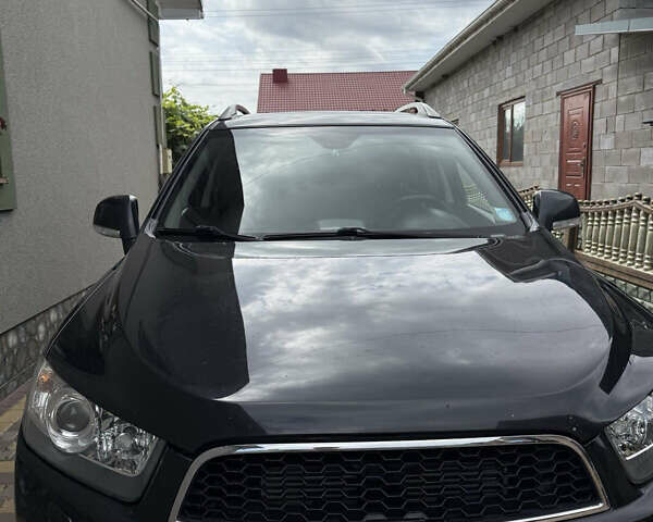 Черный Шевроле Каптива, объемом двигателя 2.2 л и пробегом 350 тыс. км за 10000 $, фото 1 на Automoto.ua