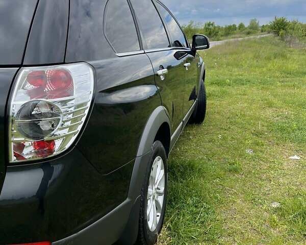 Черный Шевроле Каптива, объемом двигателя 2.23 л и пробегом 138 тыс. км за 12500 $, фото 11 на Automoto.ua