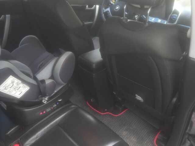 Черный Шевроле Каптива, объемом двигателя 2.2 л и пробегом 270 тыс. км за 9700 $, фото 3 на Automoto.ua