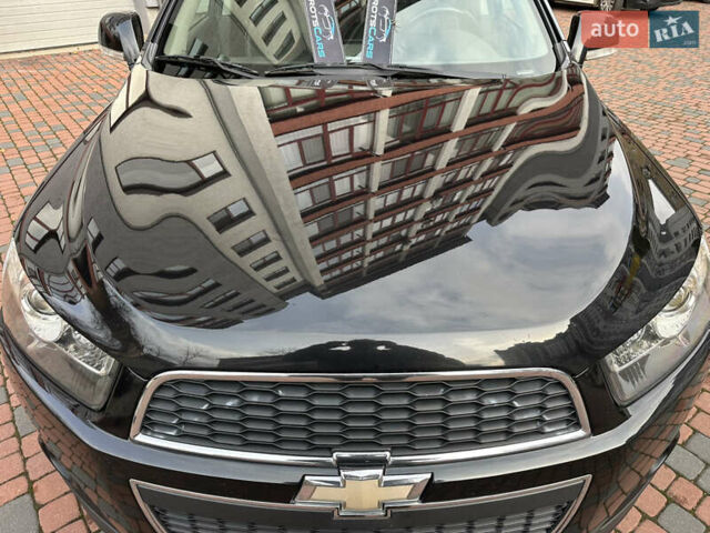 Черный Шевроле Каптива, объемом двигателя 2.38 л и пробегом 210 тыс. км за 11350 $, фото 95 на Automoto.ua