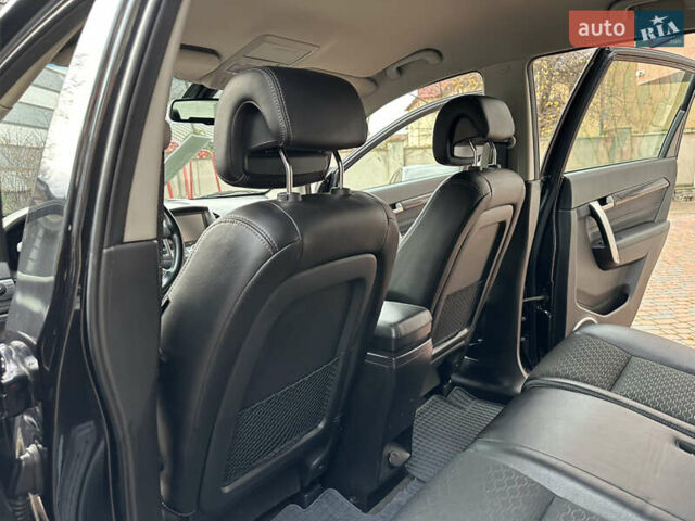 Черный Шевроле Каптива, объемом двигателя 2.38 л и пробегом 210 тыс. км за 11350 $, фото 166 на Automoto.ua