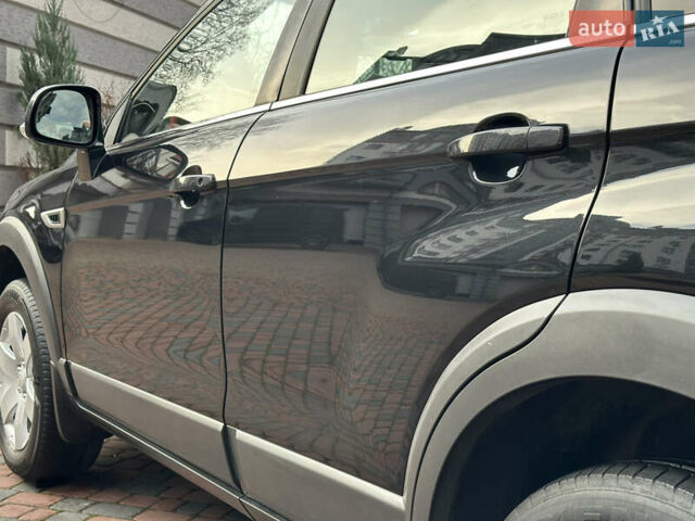 Черный Шевроле Каптива, объемом двигателя 2.38 л и пробегом 210 тыс. км за 11350 $, фото 46 на Automoto.ua