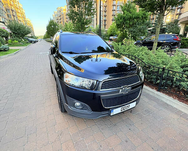 Черный Шевроле Каптива, объемом двигателя 2.23 л и пробегом 133 тыс. км за 13200 $, фото 2 на Automoto.ua