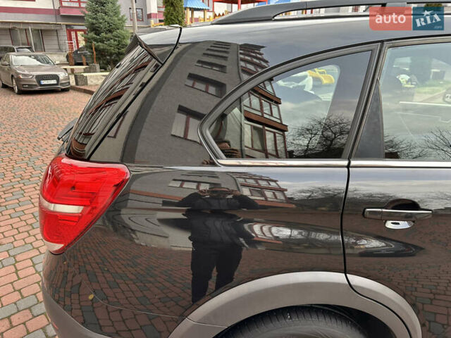 Черный Шевроле Каптива, объемом двигателя 2.38 л и пробегом 210 тыс. км за 11350 $, фото 101 на Automoto.ua