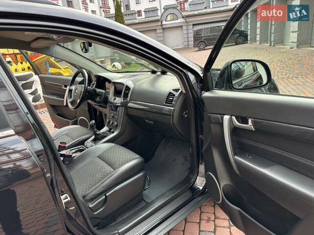 Черный Шевроле Каптива, объемом двигателя 2.38 л и пробегом 210 тыс. км за 11350 $, фото 146 на Automoto.ua