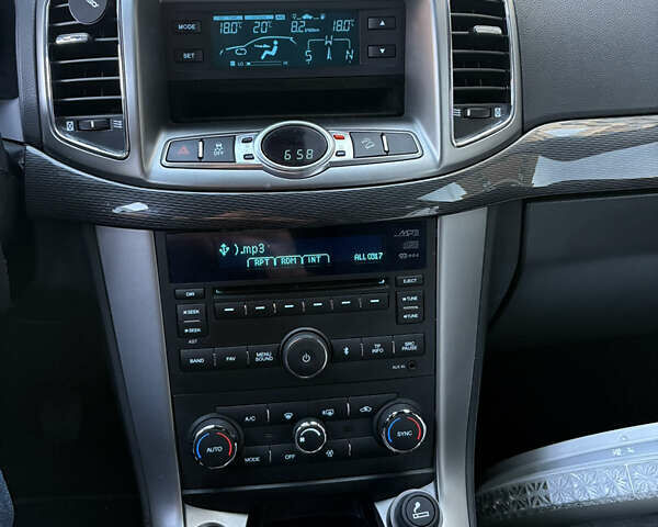 Черный Шевроле Каптива, объемом двигателя 2.23 л и пробегом 133 тыс. км за 13200 $, фото 10 на Automoto.ua