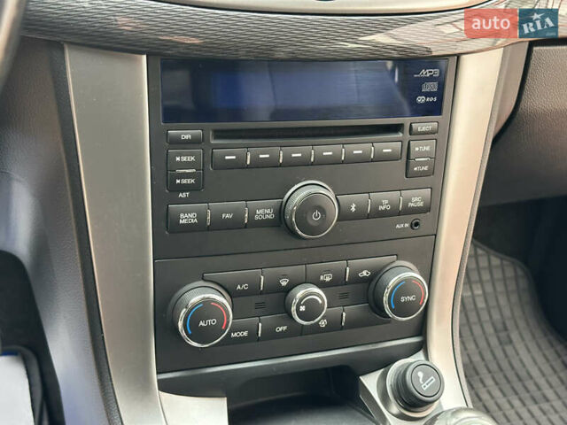 Черный Шевроле Каптива, объемом двигателя 2.38 л и пробегом 210 тыс. км за 11350 $, фото 116 на Automoto.ua