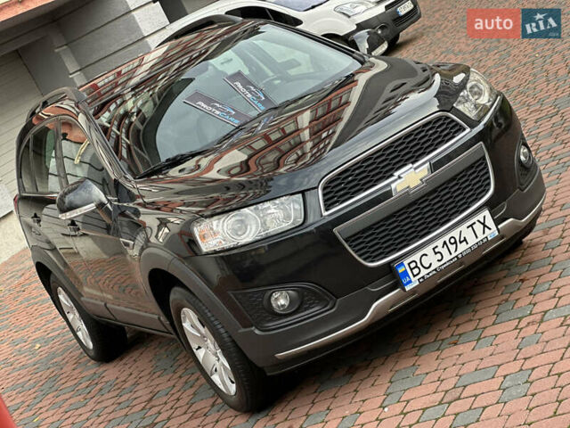 Черный Шевроле Каптива, объемом двигателя 2.38 л и пробегом 210 тыс. км за 11350 $, фото 1 на Automoto.ua
